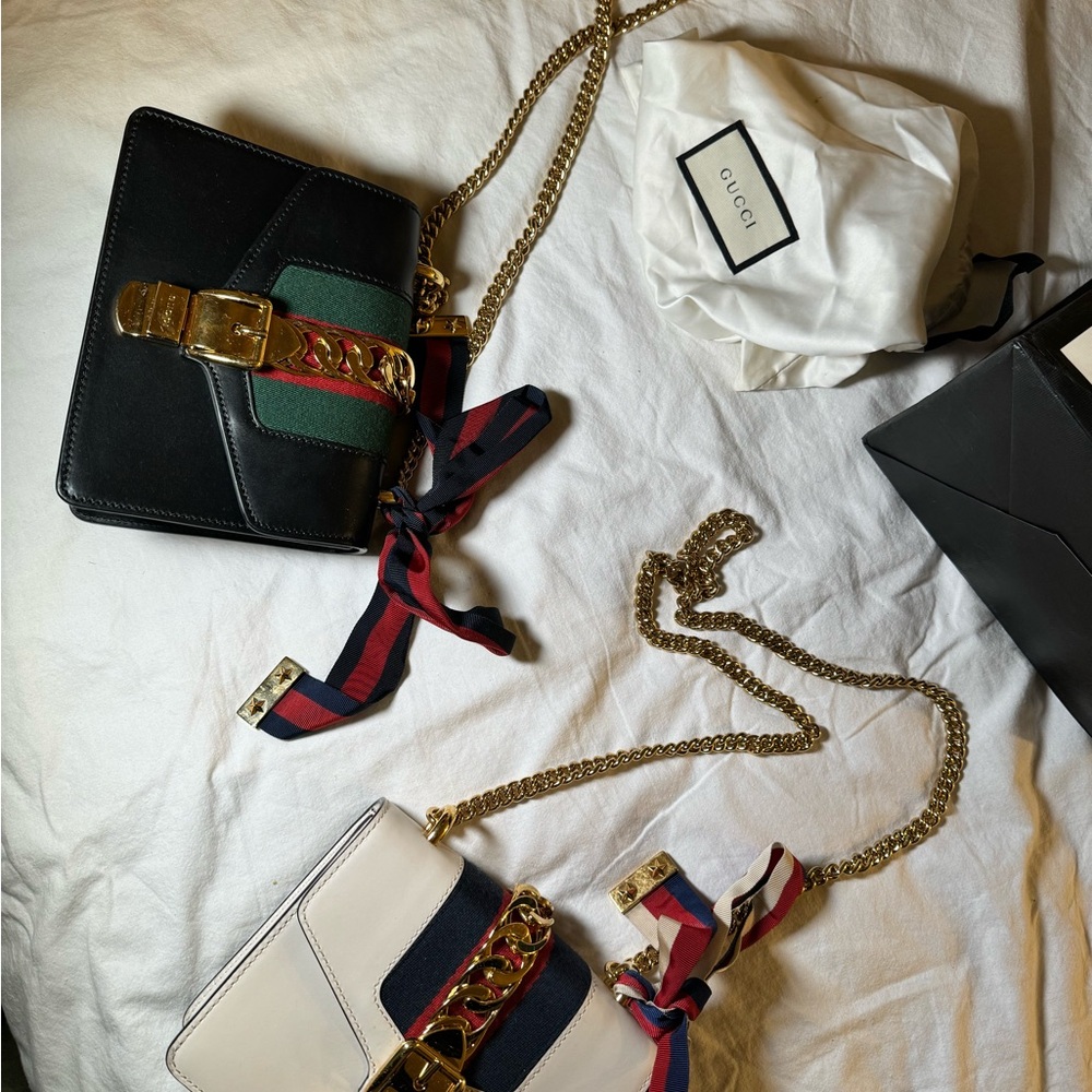 Gucci Black and White Crossbody Bags with Gold Accents